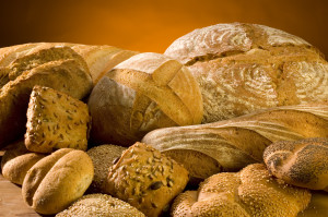 different bread arranged on table close up
